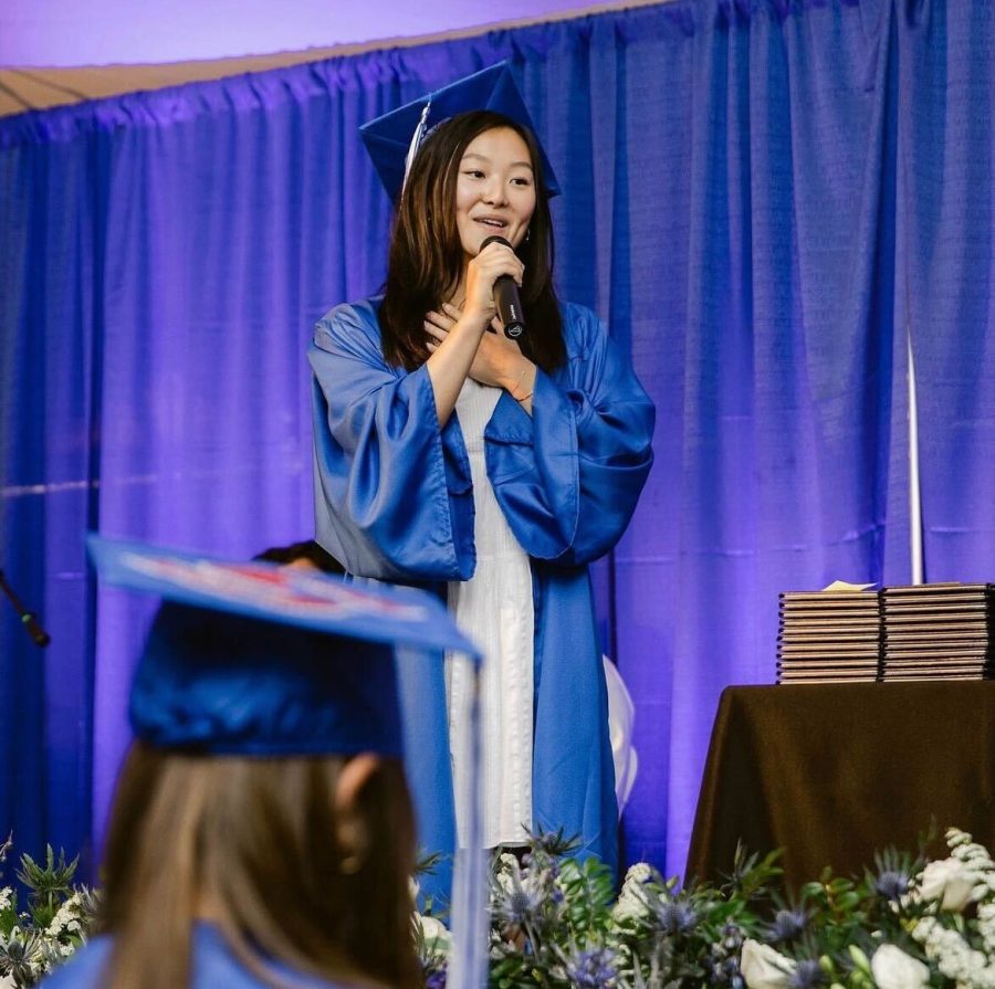 Issa Okamoto sings at her high school graduation.