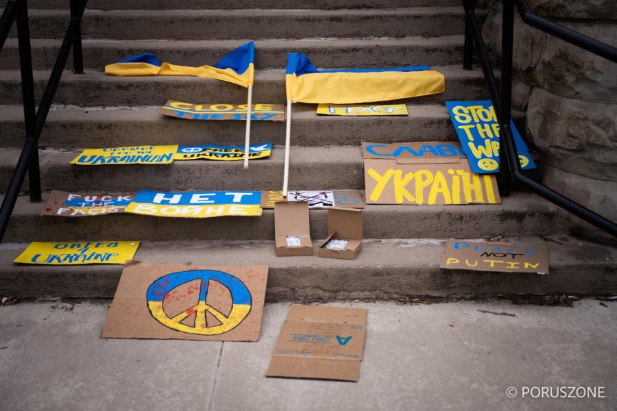 A variety of hand-made signs lay on the Wilder steps as students protested the war in Ukraine last spring.