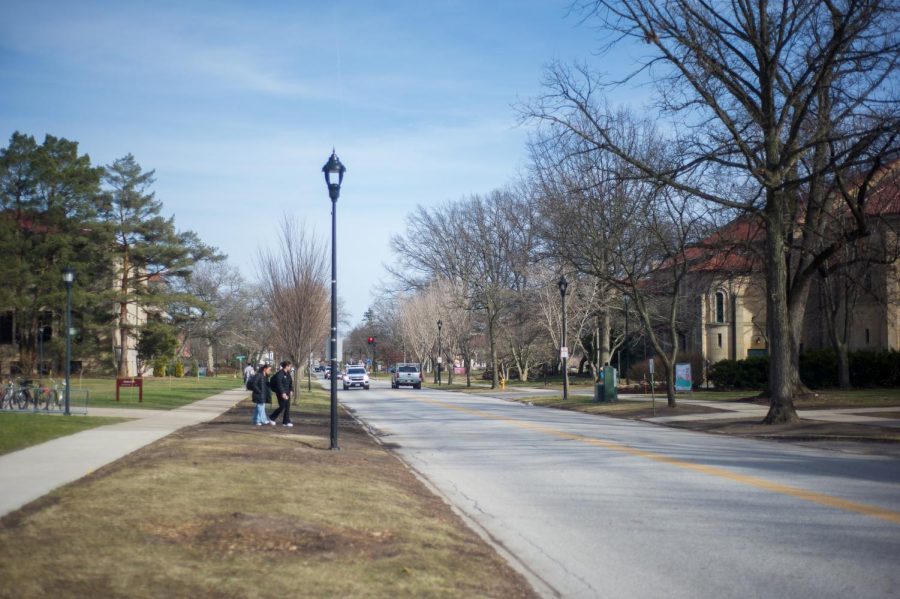 Students often cross the street between the Science Center and Wilder Hall.