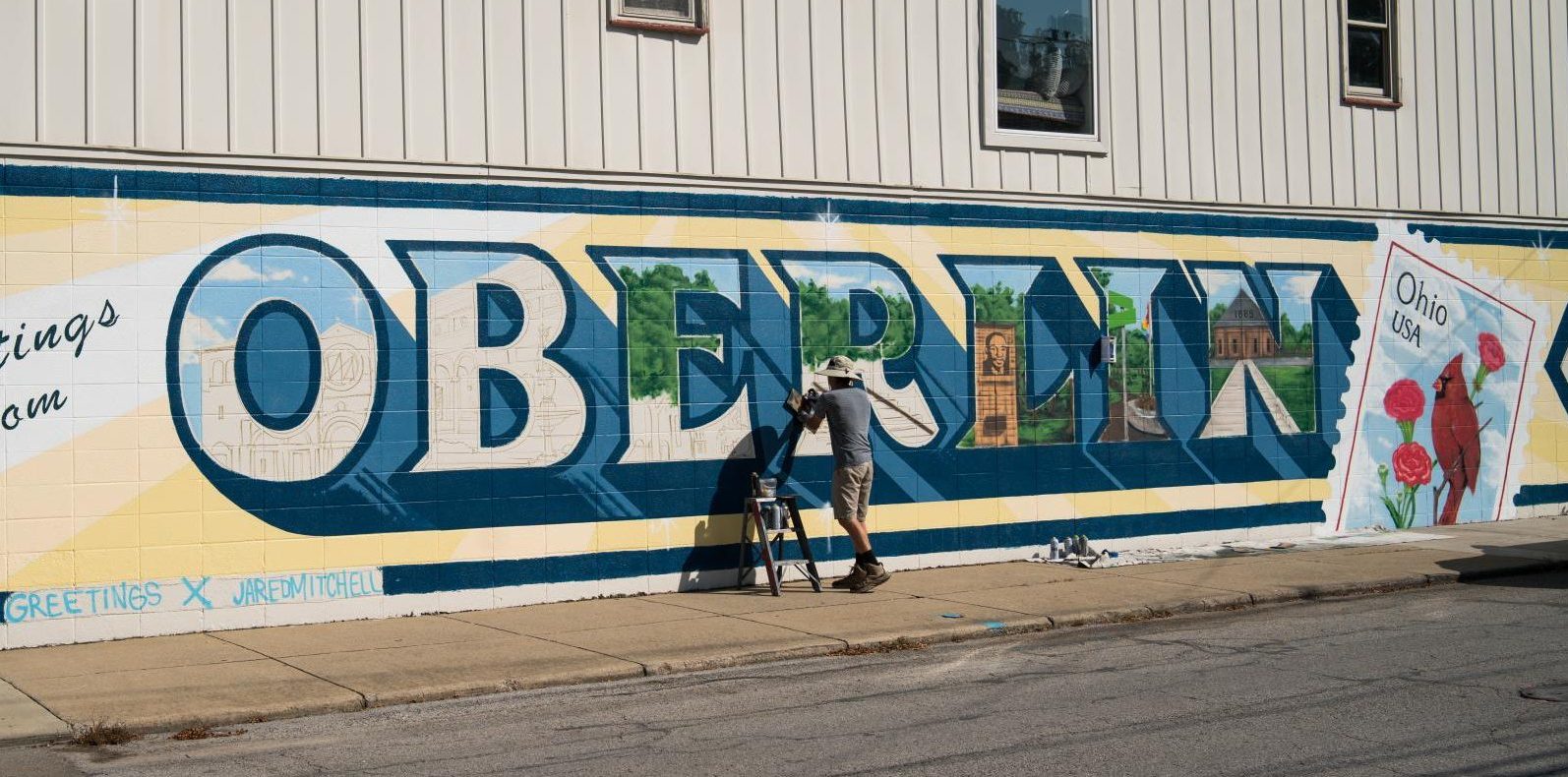 Oberlin Community Mural Project works on new mural in town.