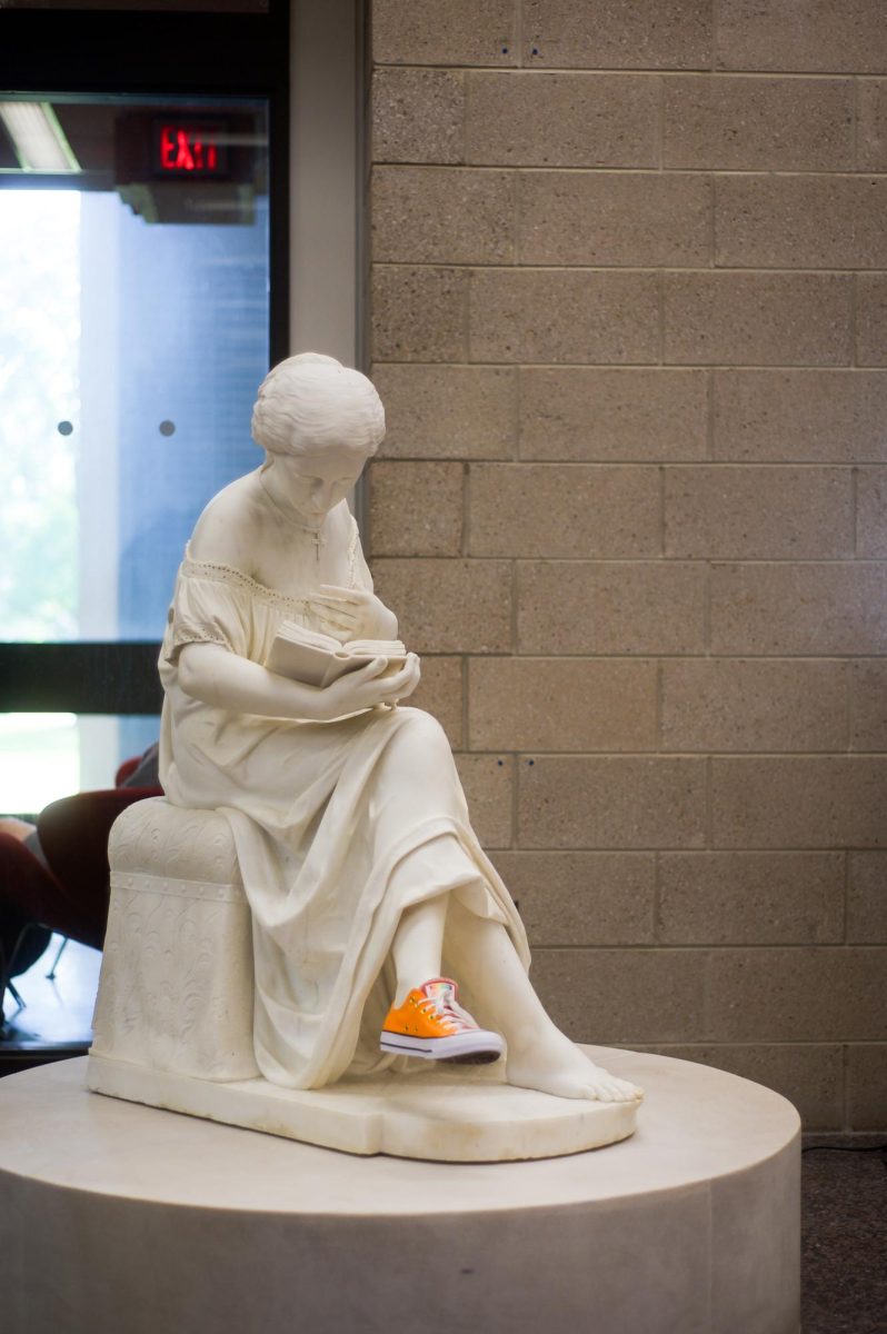 New statue outside of Mudd references the library’s mascot, “The Reading Girl.”