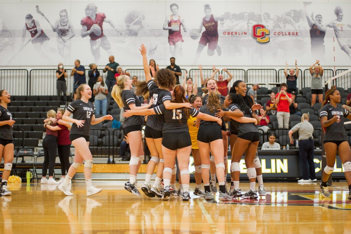 Oberlin celebrates their 3–0 win over Caltech at the Invitational.