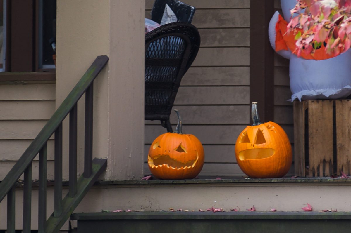 Jack-o’-lanterns are displayed on porches across town.