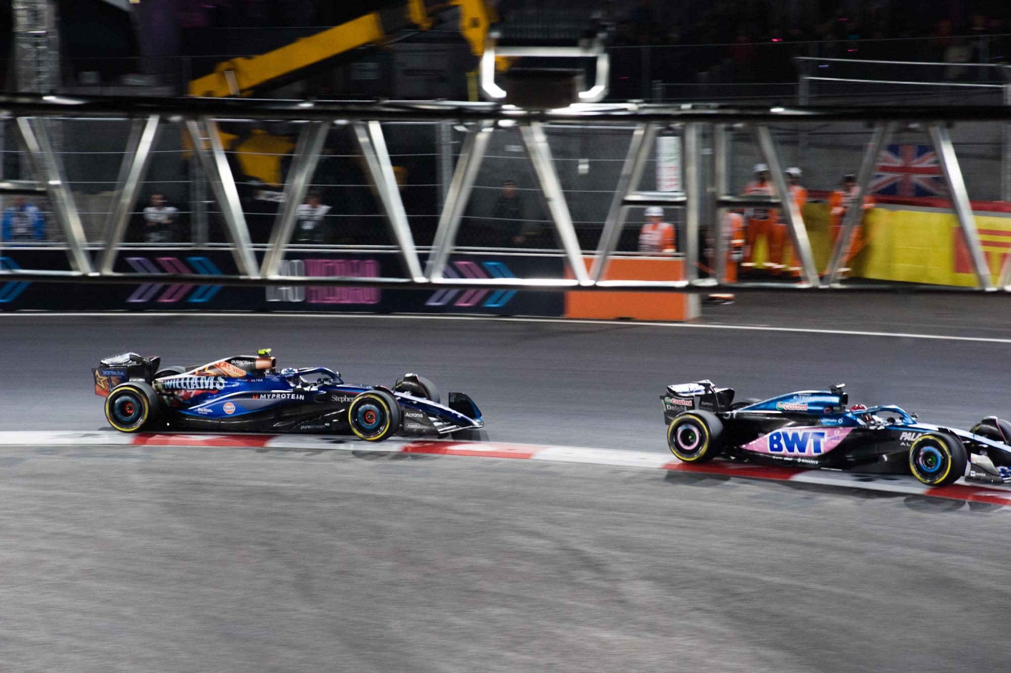 Ferrari’s Charles Leclerc chases Red Bull’s Max Verstappen for the race win in Las Vegas.