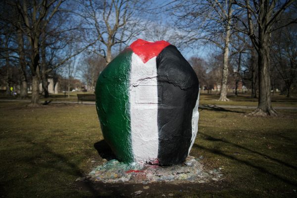 A rock in Tappan Square displays the Palestinian flag.
