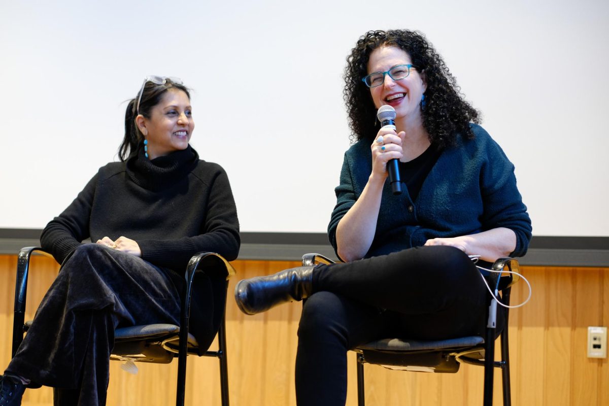 Sonia Shah, OC ’90, left, and Emily Nussbaum, OC ’88, right, speak on a career panel.