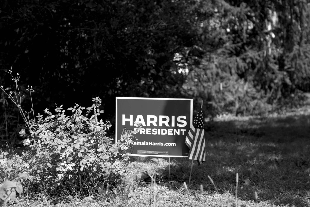 An Oberlin property displays a Harris–Walz sign.