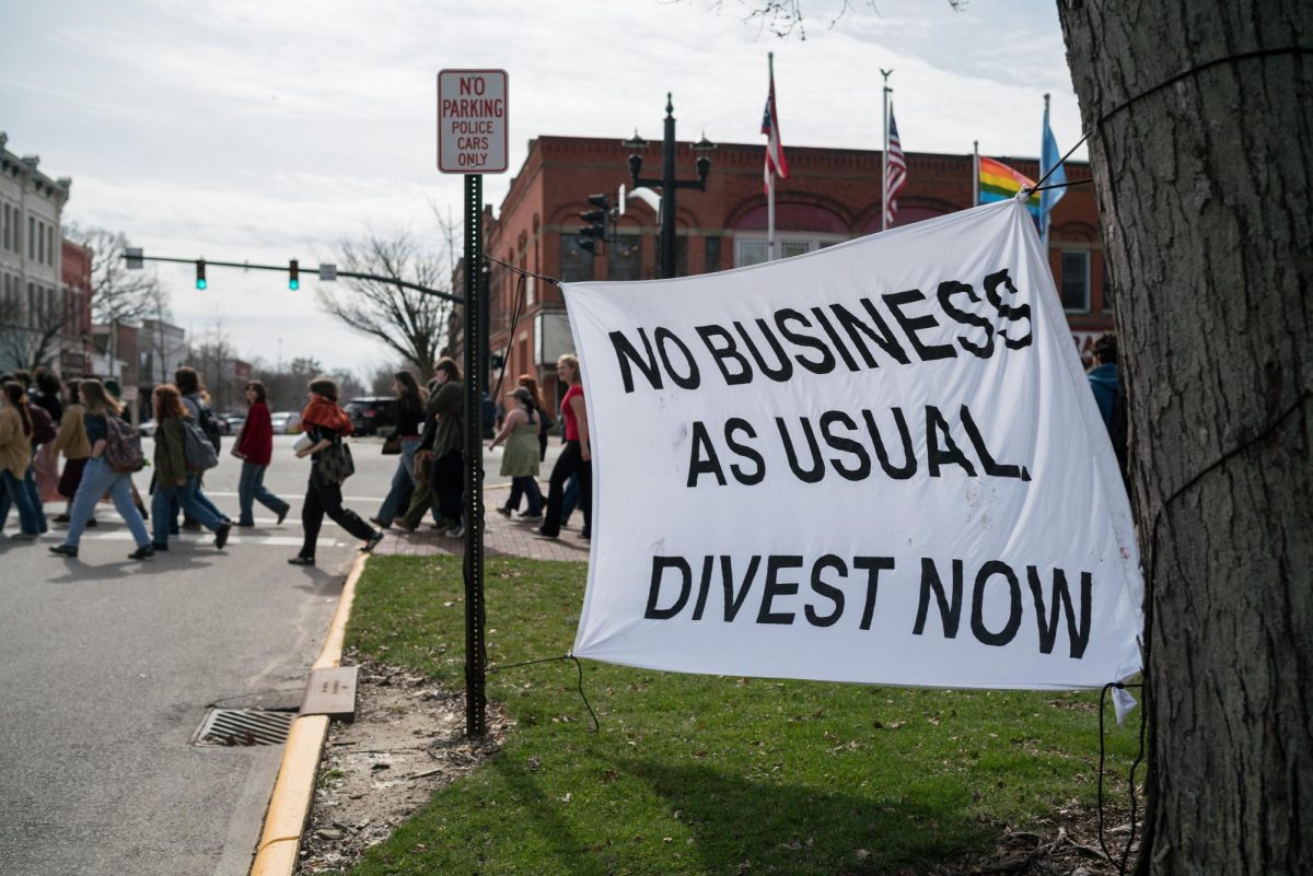 Student protest in support of divestment during the Board of Trustees meeting in March.