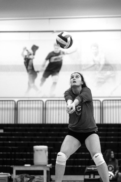 Zeynep Kaya warms up before the game against Ohio Wesleyan. 
