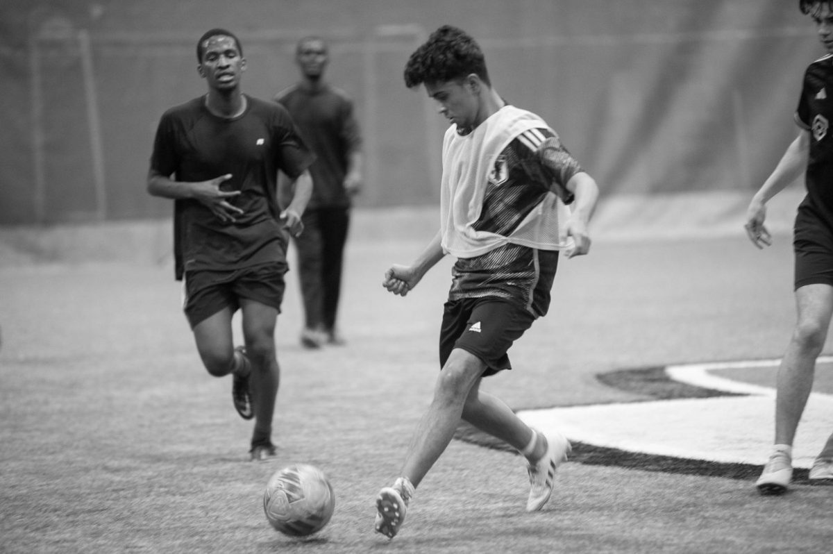 Oberlin club soccer competes at practice.