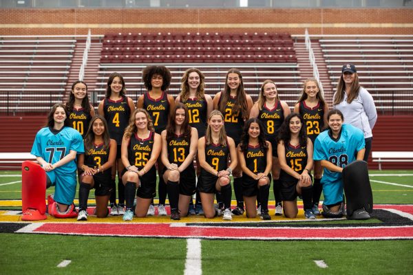 The field hockey team poses together at media day.