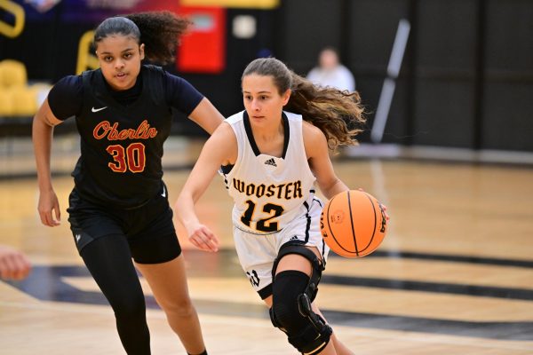 Second-year forward/center Krystal Montas guards Wooster’s Ella Dean.