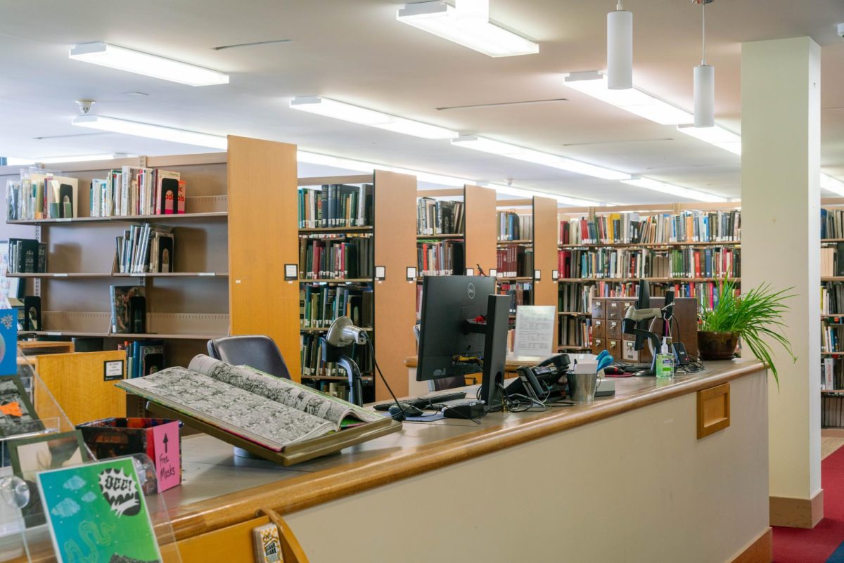 Students working at the desks at the Art Libraries have had their hours cut.