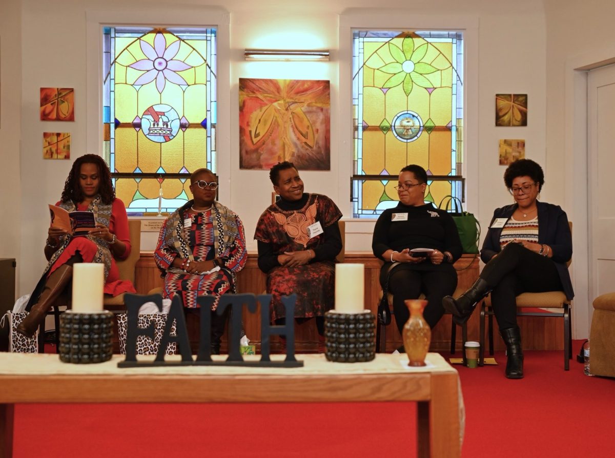 Black Women of Excellence awardees sit on the stage at Oberlin House of Lord Fellowship. Photo courtesy of Desmond Bowens 