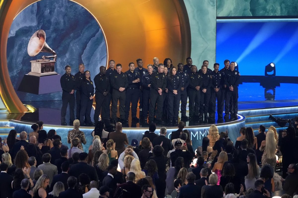 The LACFD stands to receive thunderous applause.