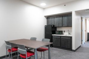 The Woodland suites' kitchens feature a microwave, sink, and refridgerator.