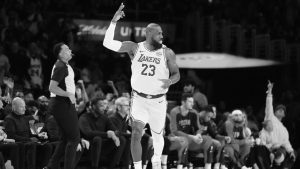 LeBron James celebrates after shooting a three-pointer. 