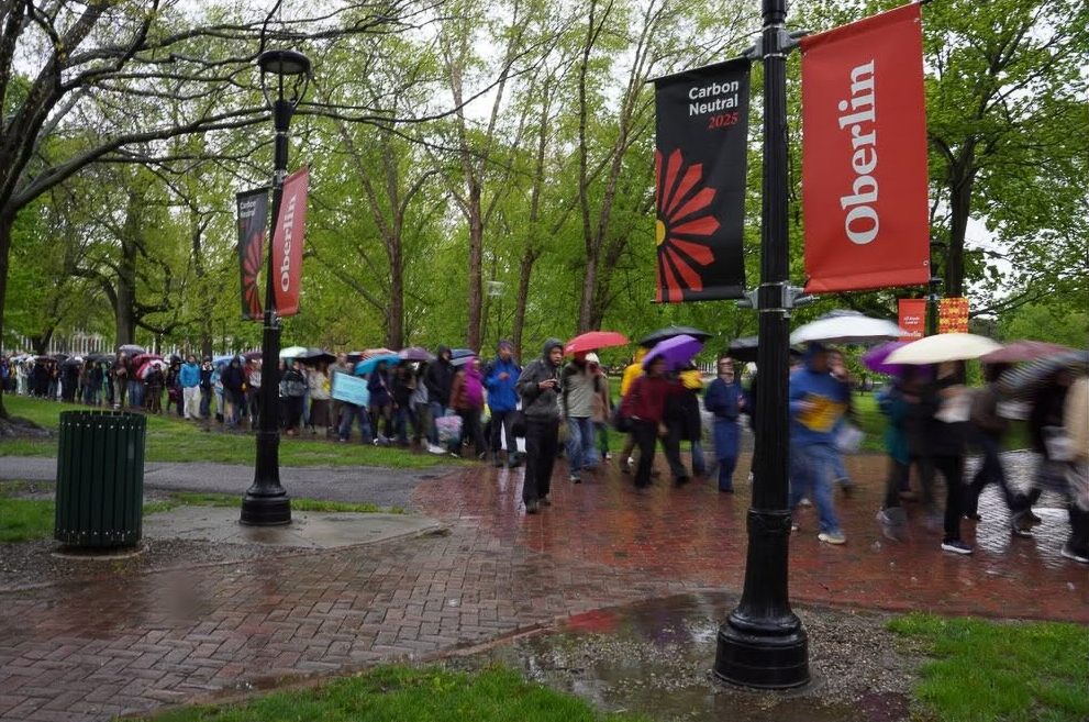 Students march across Tappan Square as part of the nationwide May Day movement.